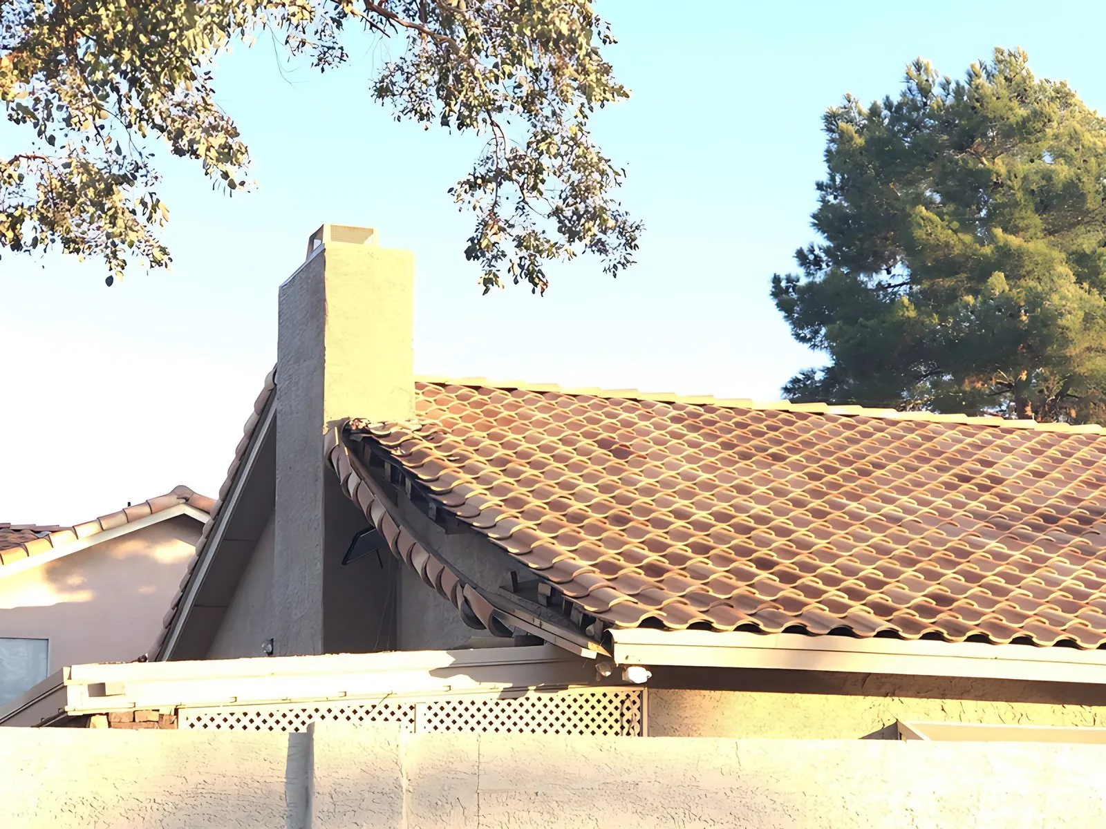 Clay tile roof on an Arizona stucco home, by Payne Roofing